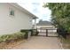 A long driveway leads to a detached garage, alongside a manicured yard at 179 Hillcrest Dr, Oviedo, FL 32765