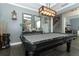 The game room offers a pool table, custom lighting, and easy access to other living areas at 179 Hillcrest Dr, Oviedo, FL 32765