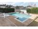 Backyard view of the rectangular pool with lounge chairs and brick surround at 179 Hillcrest Dr, Oviedo, FL 32765