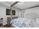 Bedroom with wooden canopy bed and built-in shelving at 202 E South St # 1048, Orlando, FL 32801