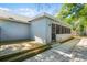 Wooden deck and walkway leading to screened porch at 2031 Eaton St, Maitland, FL 32751