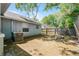 Spacious backyard with AC unit and fire pit at 2031 Eaton St, Maitland, FL 32751