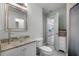 Bathroom with glass sink, granite countertop and white cabinets at 2031 Eaton St, Maitland, FL 32751