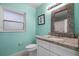 Clean bathroom with granite countertop and white cabinets at 2031 Eaton St, Maitland, FL 32751