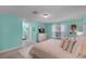 Large bedroom with a bed, dresser, and teal walls at 2031 Eaton St, Maitland, FL 32751