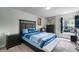 Bedroom with blue bedding and a dark wood frame at 2031 Eaton St, Maitland, FL 32751