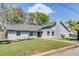 Ranch style home with gray siding, mature trees, and a spacious yard at 2031 Eaton St, Maitland, FL 32751