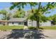 Charming light gray house with a well-maintained lawn and walkway at 2031 Eaton St, Maitland, FL 32751