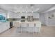 Modern kitchen with white cabinets, quartz countertops and stainless steel appliances at 2031 Eaton St, Maitland, FL 32751