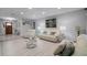 Open living area with light walls, plush seating, and a large picture window at 2031 Eaton St, Maitland, FL 32751