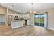 Modern kitchen featuring white cabinets, stainless steel appliances, and granite countertops at 21 Juniper Loop Cir, Ocala, FL 34480