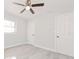 Bedroom with ceiling fan, large closet, and window with blinds at 2414 Herbison Dr, Orlando, FL 32810