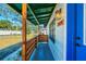 Quaint front porch with a wooden railing and well-maintained landscaping at 2414 Herbison Dr, Orlando, FL 32810