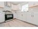 Modern kitchen with stainless steel appliances and hexagon tile backsplash at 2414 Herbison Dr, Orlando, FL 32810