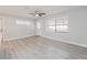 Bright living room with light gray flooring and ceiling fan at 2414 Herbison Dr, Orlando, FL 32810