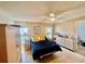 Main bedroom with a double bed and ceiling fan at 247 Cranbrook Dr, Kissimmee, FL 34758