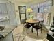 Cozy kitchen with granite counters and gray cabinets at 247 Cranbrook Dr, Kissimmee, FL 34758