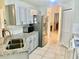 Modern kitchen with gray cabinets and granite countertops at 247 Cranbrook Dr, Kissimmee, FL 34758