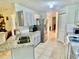 Modern kitchen with gray cabinets and granite countertops at 247 Cranbrook Dr, Kissimmee, FL 34758