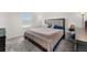 Main bedroom with large bed and window view at 2559 Relaxing Ln, Kissimmee, FL 34747