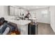 Modern kitchen with gray cabinets and white countertops at 2559 Relaxing Ln, Kissimmee, FL 34747