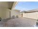 Private patio with brick pavers, two chairs, and gated access at 2559 Relaxing Ln, Kissimmee, FL 34747