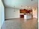 Open floor plan showing kitchen and living room with tile flooring at 2646 River Landing Dr, Sanford, FL 32771