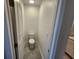 Half bathroom with standard toilet and white walls at 2713 Runners Cir, Clermont, FL 34714