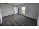 Bedroom with neutral carpet, window and views at 2713 Runners Cir, Clermont, FL 34714