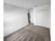 A carpeted bedroom with closet space at 2713 Runners Cir, Clermont, FL 34714