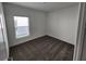 A cozy bedroom with carpet and a window providing natural light at 2713 Runners Cir, Clermont, FL 34714