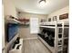 This bedroom is designed with comfort and entertainment, featuring a bunk bed and a flat-screen TV at 2931 Top Water Way, Kissimmee, FL 34746