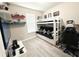 This bedroom features a bunk bed, gaming decor, light wood flooring, and modern furnishings for a youthful design at 2931 Top Water Way, Kissimmee, FL 34746