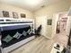 Bedroom featuring a bunk bed, desk, and gaming-themed decorations at 2931 Top Water Way, Kissimmee, FL 34746