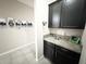 The office features dark cabinetry, light-colored walls, and tile floors at 2931 Top Water Way, Kissimmee, FL 34746