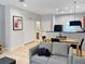 Open concept living area with dining area and kitchen at 3002 Red Ginger Rd, Kissimmee, FL 34747