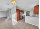 Modern kitchen with stainless steel appliances and wood cabinets at 3124 Oak Brook Ln, Eustis, FL 32736