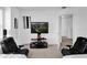Spacious game room with comfortable seating and large screen TV at 361 Preserve Pointe Blvd, Davenport, FL 33837