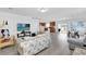 Open concept living space with kitchen and dining area views at 361 Preserve Pointe Blvd, Davenport, FL 33837