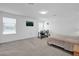 Bright bedroom with a desk, bed, and ample natural light at 361 Preserve Pointe Blvd, Davenport, FL 33837