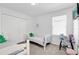 Cozy bedroom featuring twin beds and plenty of closet space at 361 Preserve Pointe Blvd, Davenport, FL 33837