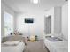 Bright ' bedroom with two twin beds, plenty of toys, and a window with blinds at 361 Preserve Pointe Blvd, Davenport, FL 33837