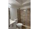 Bathroom featuring a tiled shower and modern vanity at 4826 Marks Terrace # 389, Orlando, FL 32811
