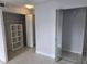 Inside a bedroom closet: mirrored closet, shelves, and rod for maximum storage at 4826 Marks Terrace # 389, Orlando, FL 32811