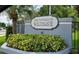 Townes of Southgate sign with lush, colorful landscaping, promoting a welcoming aesthetic at 4826 Marks Terrace # 389, Orlando, FL 32811