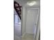Hallway with view into stairs and balcony at 4826 Marks Terrace # 389, Orlando, FL 32811