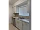 Kitchen featuring updated appliances, granite countertops, and modern cabinetry at 4826 Marks Terrace # 389, Orlando, FL 32811