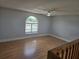 Cozy loft area with wood floors and a window overlooking the front yard at 4826 Marks Terrace # 389, Orlando, FL 32811