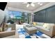 Spacious screened lanai with comfortable seating, ceiling fan, and views of the outdoor area at 508 Zamora Way, Davenport, FL 33837