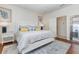 Bright bedroom with a comfortable bed, side tables, and stylish accents creating a relaxing retreat at 508 Zamora Way, Davenport, FL 33837